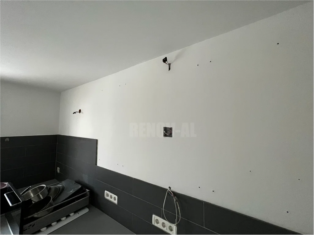 Ratissage mur après